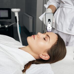 Pretty,Woman,Enjoying,Radiofrequency,Lifting,Procedure,For,Her,Face,And